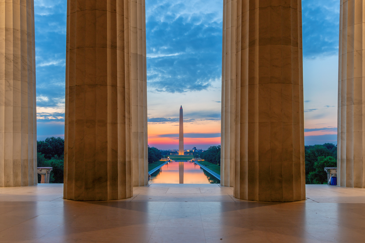 Sunrise view at Washington Monument and Reflecting Pool from Lincoln Memorial in Washington, D.C., USA.